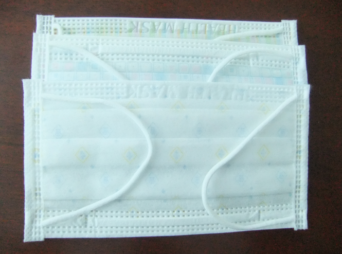 高速全電內(nèi)耳包邊口罩機(jī)HD-11107 高速全電內(nèi)耳包邊口罩機(jī)HD-11107